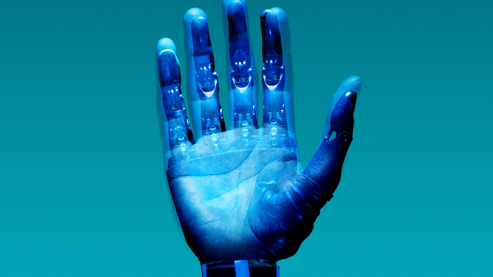 38 robotics blue robotic prosthetic hand against teal background sbVu5zitZt0
