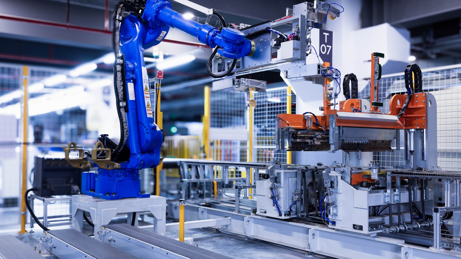 40 robotics blue industrial robot arm in factory sz1CHL7Pky0